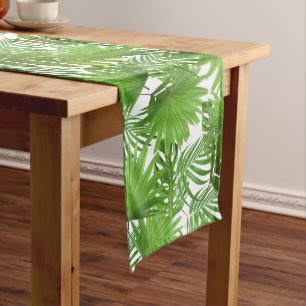 Chemin De Table Moyen Feuilles de palmiers verts tropicaux sur vert fore