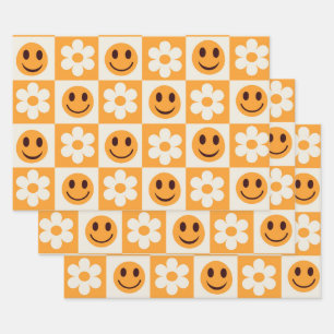 Chequered white flowers and orange smiling faces  wrapping paper sheet