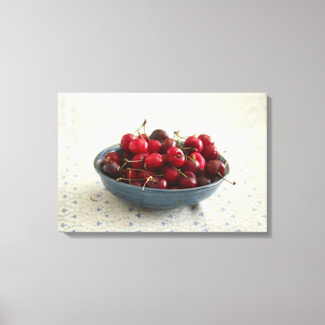 Cherries in a blue bowl  canvas print (Front)