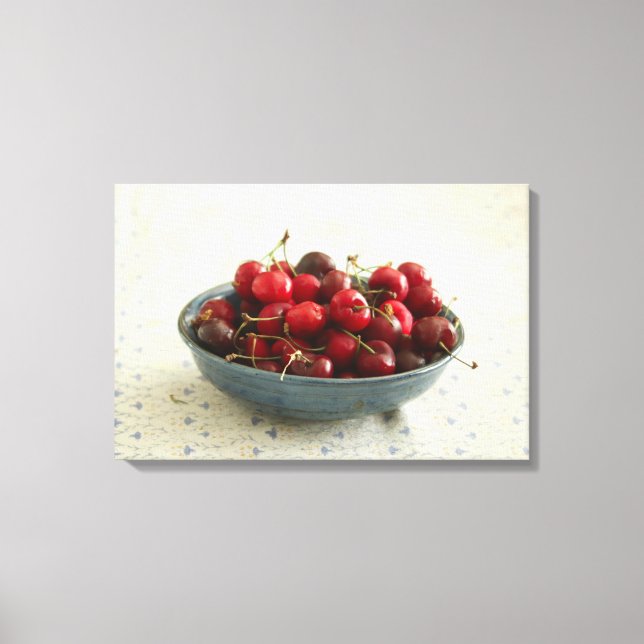 Cherries in a blue bowl  canvas print (Front)