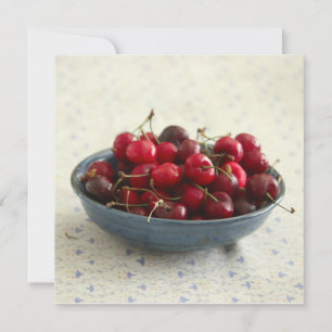 Cherries in a blue bowl card