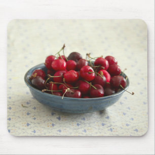 Cherries in a blue bowl mouse pad