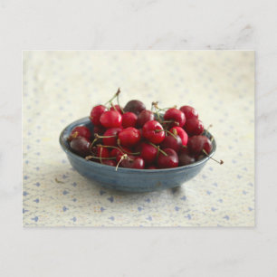 Cherries in a blue bowl  postcard