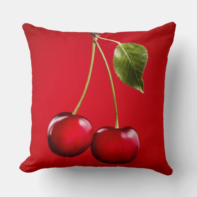Cherries with Leaf on Red Background Throw Pillow (Front)