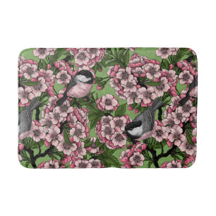 Cherry blossom and chickadees on green bath mat