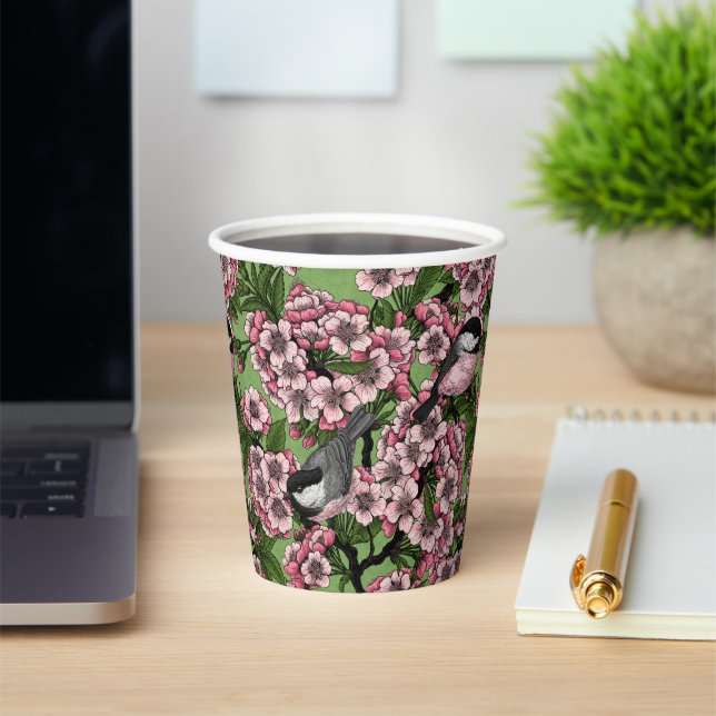 Cherry blossom and chickadees on green paper cups (Insitu)