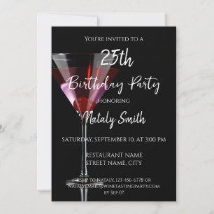 Cherry martini cocktail on black invitation