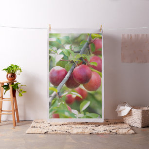 Cherry plum on branch fabric