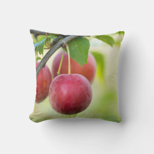 Cherry plum on branch throw pillow