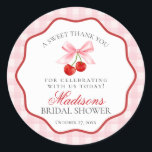 Cherry Sweet Pink Coquette Bow Bridal Shower Classic Round Sticker<br><div class="desc">Someone cherry sweet is tying the knot and you’re the cherry on top of their sweet celebration. Add a nostalgic touch to your bridal shower with this Pink Gingham Cherry Party Decor featuring vibrant red cherries and pastel pink gingham, all within a whimsical wavy border. With this playful design, get...</div>