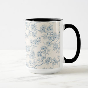 Chery blossom branches in blue and off white mug
