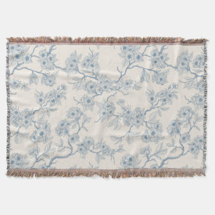 Chery blossom branches in blue and off white throw blanket