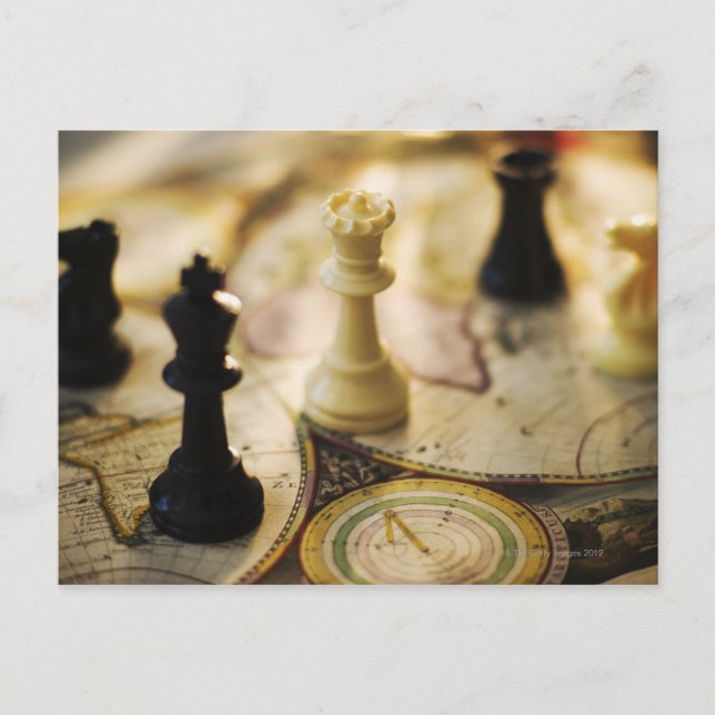 Chess pieces on old world map postcard (Front)