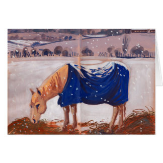 Cheval blanc dans la neige