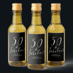 Chic 50 Fabulous Black White Name 50th Birthday Wine Label<br><div class="desc">Celebrate turning 50 in style with this black and white elegant 50th birthday wine label with the text 50 and fabulous in white chic script calligraphy and modern typography. Simply add your name and your 50th birthday party gift wine labels are ready to go. Exclusively designed for you by Happy...</div>