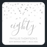 Chic 80th Birthday Party Silver Confetti Square Sticker<br><div class="desc">Help her celebrate her 80th birthday in style with this simple but elegant design, featuring faux silver triangular confetti sifting down on the word "eighty" in silver grey handwriting font on a white background. Personalize it with the name of the honoree in silver grey sans serif font, along with the...</div>