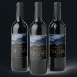 Chic Agate Geode Blue Gold 50th Birthday Party Wine Label<br><div class="desc">These chic 50th birthday wine bottle labels feature a watercolor image of an agate geode in shades of blue with faux gold glitter highlights. The words "50th Birthday" appear in faux gold glitter in a decorative modern handwriting font. Customize it with the name of the honoree and the date in...</div>