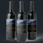 Chic Agate Geode Blue Gold 50th Birthday Party Wine Label<br><div class="desc">These chic 50th birthday wine bottle labels feature a watercolor image of an agate geode in shades of blue with faux gold glitter highlights. The words "50th Birthday" appear in faux gold glitter in a decorative modern handwriting font. Customize it with the name of the honoree and the date in...</div>