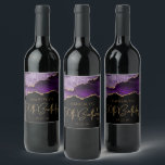 Chic Agate Geode Purple Gold 50th Birthday Party Wine Label<br><div class="desc">These chic 50th birthday wine bottle labels feature a watercolor image of an agate geode in shades of purple with faux gold glitter highlights. The words "50th Birthday" appear in faux gold glitter in a decorative modern handwriting font. Customize it with the name of the honoree and the date in...</div>