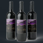 Chic Agate Geode Purple Gold 70th Birthday Party Wine Label<br><div class="desc">These chic 70th birthday wine bottle labels feature a watercolor image of an agate geode in shades of purple with faux gold glitter highlights. The words "70th Birthday" appear in faux gold glitter in a decorative modern handwriting font. Customize it with the name of the honoree and the date in...</div>