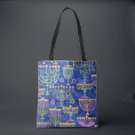Chic Blue Gold Menorah Star of David Hanukkah Tote Bag<br><div class="desc">This holiday tote bag features a chic pattern of gold,  green and purple menorah and gold Star of David on a blue background. Designed by world renowned artist Tim Coffey.</div>
