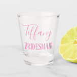 Chic Bridesmaid Favour Shot Glass<br><div class="desc">Shop chic bridesmaids gifts at Weddings by Rhoadie. Featuring a pretty pink design, this shot glass displays your bridesmaid name in lovely cursive font. Underneath is "Bridesmaid" written in cute text. Makes a great bachelorette party favour. Personalize your shot glass today!</div>