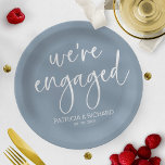 Chic Calligraphy We're Engaged Engagement Party Paper Plate<br><div class="desc">A stylish calligraphy engagement party paper plate. Easy to personalize with your details. CUSTOMIZATION: If you need design customization,  please contact me through chat; if you need information about your order,  shipping options,  etc.,  please get in touch with Zazzle support directly.</div>