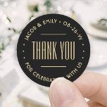 Chic Deco Typography Thank You Black & Gold Classic Round Sticker<br><div class="desc">Add an elegant touch to wedding thank you cards and reception party favours with round customized stickers / envelope seals. All wording on this template is simple to personalize for a bridal shower, anniversary, vow renewal or other occasion. The text in a circle can be changed to a name and...</div>