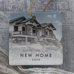 Chic First Christmas In Our New Home Photo Ceramic Ornament<br><div class="desc">This chic first Christmas in our new home photo ceramic ornament is the perfect modern Christmas tree decoration. The simple design features classic minimalist black and white typography with a rustic boho feel. This keepsake ornament reads "first Christmas in our new home". Personalize your double-sided ornament with a photo and...</div>