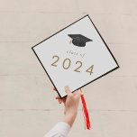 Chic Gold Hat Class of 2024 Graduation Cap Topper<br><div class="desc">This chic gold hat class of 2024 graduation cap topper is perfect for a modern graduation. The simple design features classic white and yellow gold typography with a black and gold watercolor graduation hat.

Personalize your graduation cap with the year.</div>