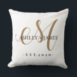Chic Gold M Monogram Script Name Wedding Date Throw Pillow<br><div class="desc">Chic, modern gold monogrammed wedding outdoor pillow with your names and year established in black elegant hand lettered script calligraphy and classic typography with a gold M monogram on a white background. Simply add your names, monogram and year established beneath. Stylish design and perfect wedding table decor. Contact me for...</div>