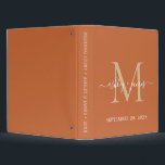 Chic Gold Monogram Script Burnt Orange Wedding Binder<br><div class="desc">Chic wedding album with your stylish monogram initial in gold and your names in white elegant handwritten script calligraphy on a burnt orange background. Simply add your names, monogram and wedding date. A beautiful wedding keepsake gift album for all your wedding photos and memories. Exclusively designed for you by Happy...</div>