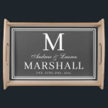 Chic Grey Newlywed Couple Monogram Name Wedding Serving Tray<br><div class="desc">Modern minimalist personalized dark grey and white serving tray with the couples first names in a calligraphy script,  last name monogram,  full last name,  and wedding date available in customizable templates.  A stylish,  elegant newlywed gift for the bride and groom with a custom personal touch.</div>