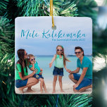 Chic Mele Kalikimaka Family Beach Vacation Photo Ceramic Ornament<br><div class="desc">Chic customizable beach family photo Christmas ornament with your favourite tropical photo in the sun. Add a full photograph of your favourite memory from your island vacation to the coast on the front and one on the back. A beautiful coastal holiday ornament gift with pretty blue script over the picture....</div>