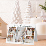 Chic Minimalist Christmas Photo Collage Folded Holiday Card<br><div class="desc">Elegant minimalist Merry Christmas cards with chic handwritten scrawl above your family photo collage of your 5 favorite 2025 pictures. Chic and contemporary Christmas cards featuring one vertical photograph in the center and 4 square pictures on the sides.</div>