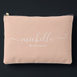 Chic Minimalist Peach Pink Personalized Bridesmaid Accessory Pouch<br><div class="desc">Introducing our Chic Minimalist Peach Pink Personalized Bridesmaid Accessory Pouch, a stylish and versatile gift designed to celebrate your bridesmaids in elegance. This accessory pouch is the epitome of modern chic, perfect for any occasion from bridesmaid proposals to bridal showers. Crafted with a minimalist design, this pouch features a deep...</div>