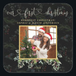 Chic Our First Christmas Calligraphy Winter Photo Square Sticker<br><div class="desc">Our First Christmas Floral Snowflake Photo design. It features modern "our first christmas" calligraphy,  watercolor leaves,  berries arrangement,  your photo on a faded winter greenery background on black. It's easy to add your photo and info. More ideas in my Holidays Collection.</div>