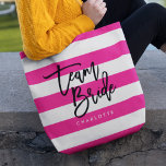 Chic Pink and White Stripes Black Team Bride Tote Bag<br><div class="desc">All-Over-Print Tote featuring the words "Team Bride" in black trendy script against a pink and white stripes pattern background. Perfect for weddings for bridesmaids, maid of honour and flower girl. For other matching items see here https://www.zazzle.com/collections/119250194970828530?rf=238364477188679314 Personalize it by replacing the placeholder text. For more options such as to change...</div>