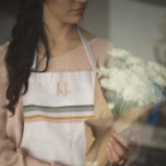 Chic Retro Stripes Monogram Apron<br><div class="desc">A minimalist monogram design with large typography initials in a classic font with your name below and chic retro rainbow coloured stripes. Trendy monogrammed design. Classy and fashionable this apron makes the perfect kitchen accessory. Add your custom wording to this design by using the "Edit this design template" boxes on...</div>