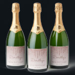 Chic Rose Gold Glitter Drip 90th Birthday Party Sparkling Wine Label<br><div class="desc">These chic,  feminine ninetieth birthday sparkling wine bottle labels feature a sparkly rose gold faux glitter drip border and rose gold ombre background. Personalize them with her name in dark rose handwriting script,  with her birthday and date below in sans serif font.</div>