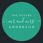 Chic Script Future Mr Mrs Emerald Green Wedding Classic Round Sticker<br><div class="desc">Chic, modern and simple wedding envelope seal with the text the future Mr and Mrs in white elegant handwritten script calligraphy and stylish typography on an emerald green background. Simply add your future married surname. Exclusively designed for you by Happy Dolphin Studio. If you need any help or matching products...</div>