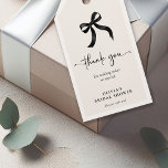 Chic She's Tying the Knot Black Bow Bridal Shower Gift Tags<br><div class="desc">Enhance your bridal shower favours with our chic black pink bow 'She's Tying the Knot Gift tags. These delightful tags add a touch of elegance to any favour, complementing the theme perfectly. Make your guests feel special with these lovely gift tags, designed to coordinate effortlessly with your bridal shower decor....</div>
