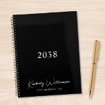 Chic Signature Script Monogram Black Business Planner<br><div class="desc">Plan ahead in style with this minimalist black personalized planner. Featuring a sleek, modern layout with your monogram name in an elegant white signature script, this planner blends functionality with refined personal branding. The understated cover design makes it ideal for work, school, goal setting, or daily scheduling. This planner also...</div>