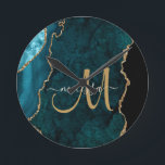 Chic Teal Gold Glitter Agate Custom Monogram Round Clock<br><div class="desc">Add a touch of glitter and glam to your home decor with this elegant personalized clock featuring a teal agate accented with faux gold glitter. Personalize your monogram initial in hand lettered script calligraphy with your name above. A unique girly gift for birthday, holidays and any special occasion. Designed just...</div>