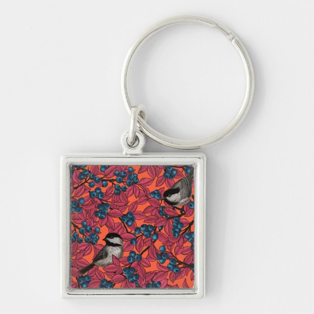 Chickadee birds on blueberry branches on orange keychain (Front)