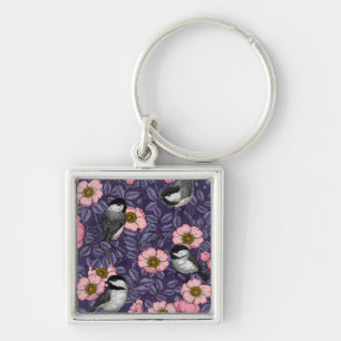 Chickadees in the wild rose in pink and violet keychain