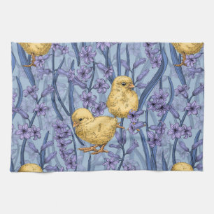 Chickens and hyacinths on sky blue kitchen towel