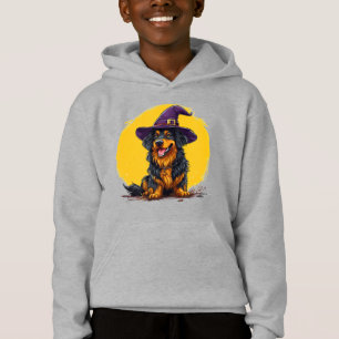 Chien joyeux d'Halloween portant un chapeau de sor