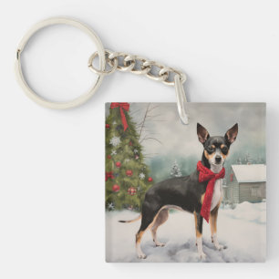 Chien Rat Terrier dans la neige de Noël