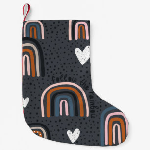 Childish seamless pattern with hand drawn rainbow, small christmas stocking